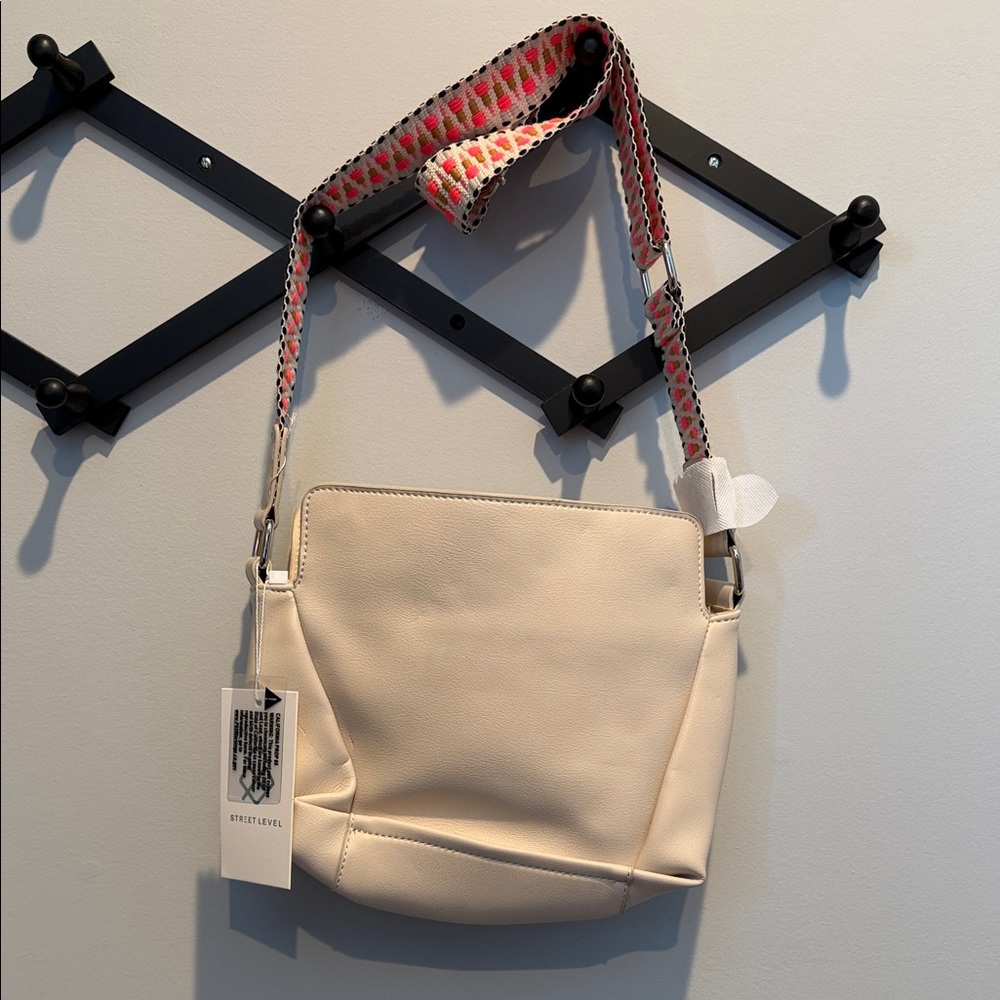Street Level Cream Crossbody Bag with Patterned Strap